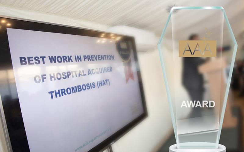 Anticoagulation Achievement Awards - Trophy and video screen showing certificate in Houses of Parliament awards event ceremony Image 3